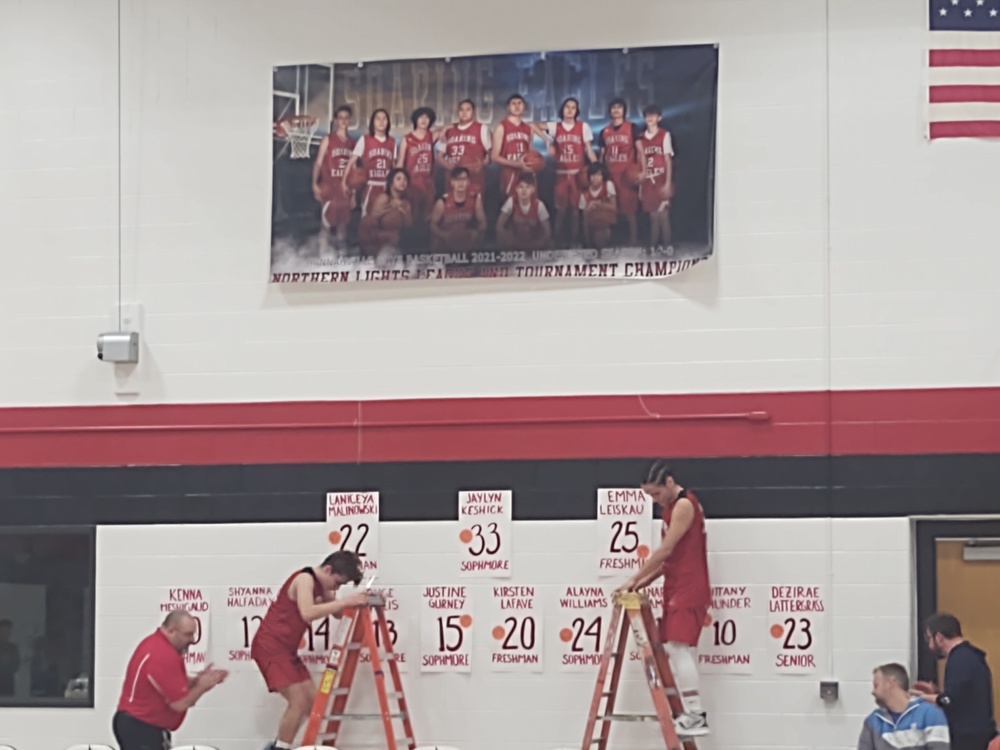 Soaring Eagles Players Unveil Championship Banner